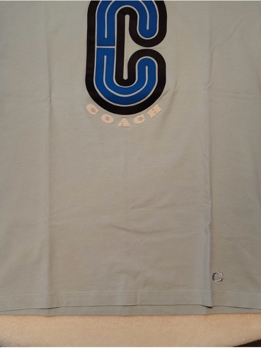Coach Men’s Light blue Tee with Blue and Black Logo, size M